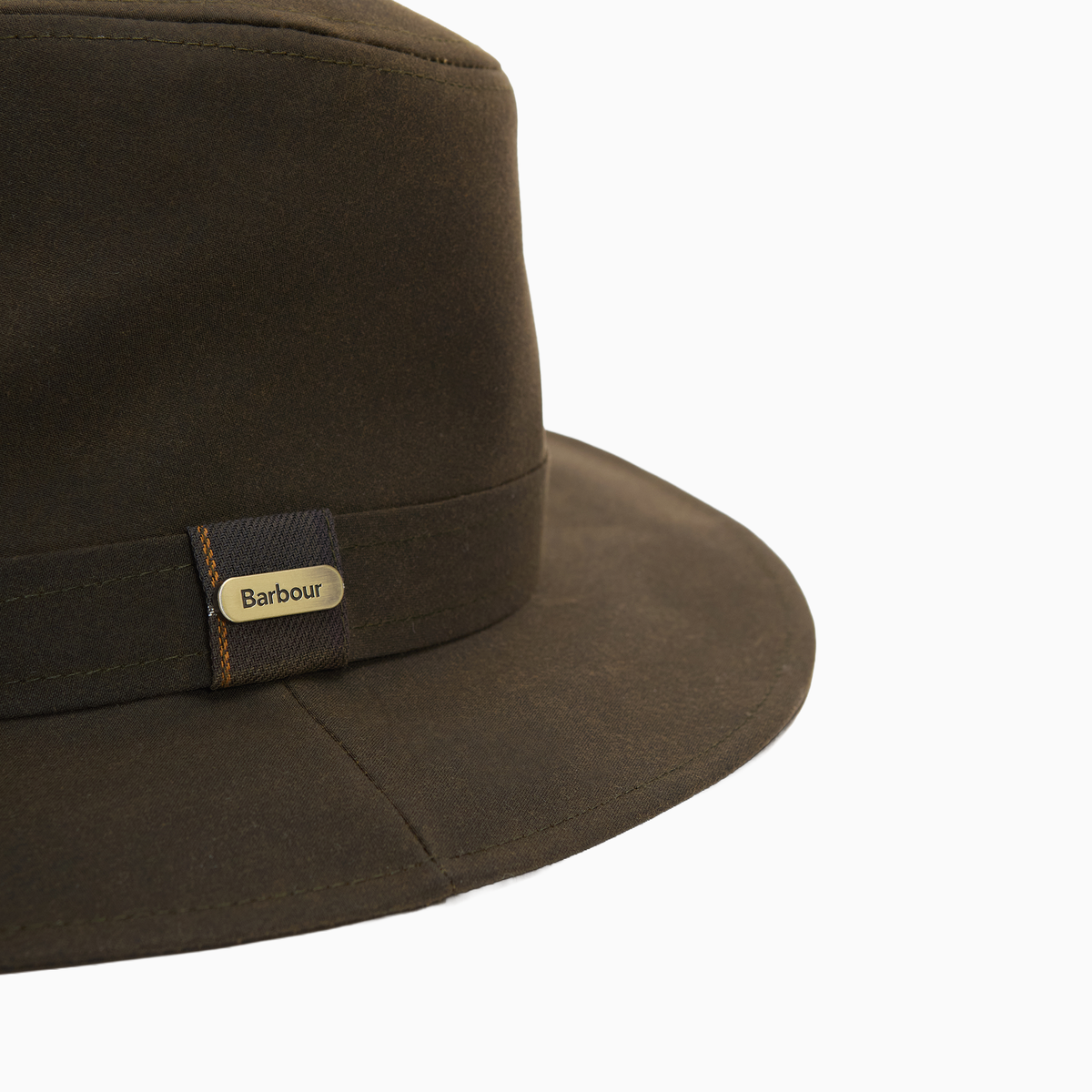 Close-up of the Barbour Vintage Wax Bushman Hat in Olive Green, showing the hatband, metal logo badge and stitched brim.