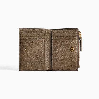 Open R.M. Williams Ranger Wallet in Khaki, showing the internal card slots, embossed logo, press-stud fastening and zipped side compartment.