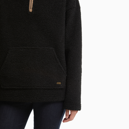 Close-up of the Barbour Bamburgh Fleece in Black, showing the textured fabric, kangaroo pocket and small metal logo badge.